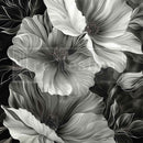 Black and white floral design on a black background