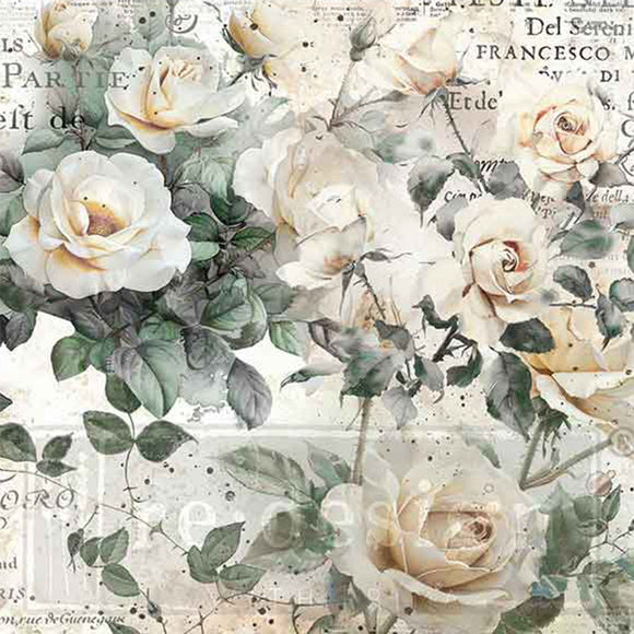 Close-up of a fiber paper design featuring creamy white roses against vintage French writing.