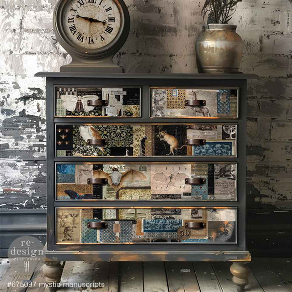 A 5-drawer chest dresser is painted grey and features ReDesign with Prima's Mystic Manuscript fiber paper on the drawers.