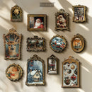 Collection of framed artworks on a wall, featuring various scenes and subjects.