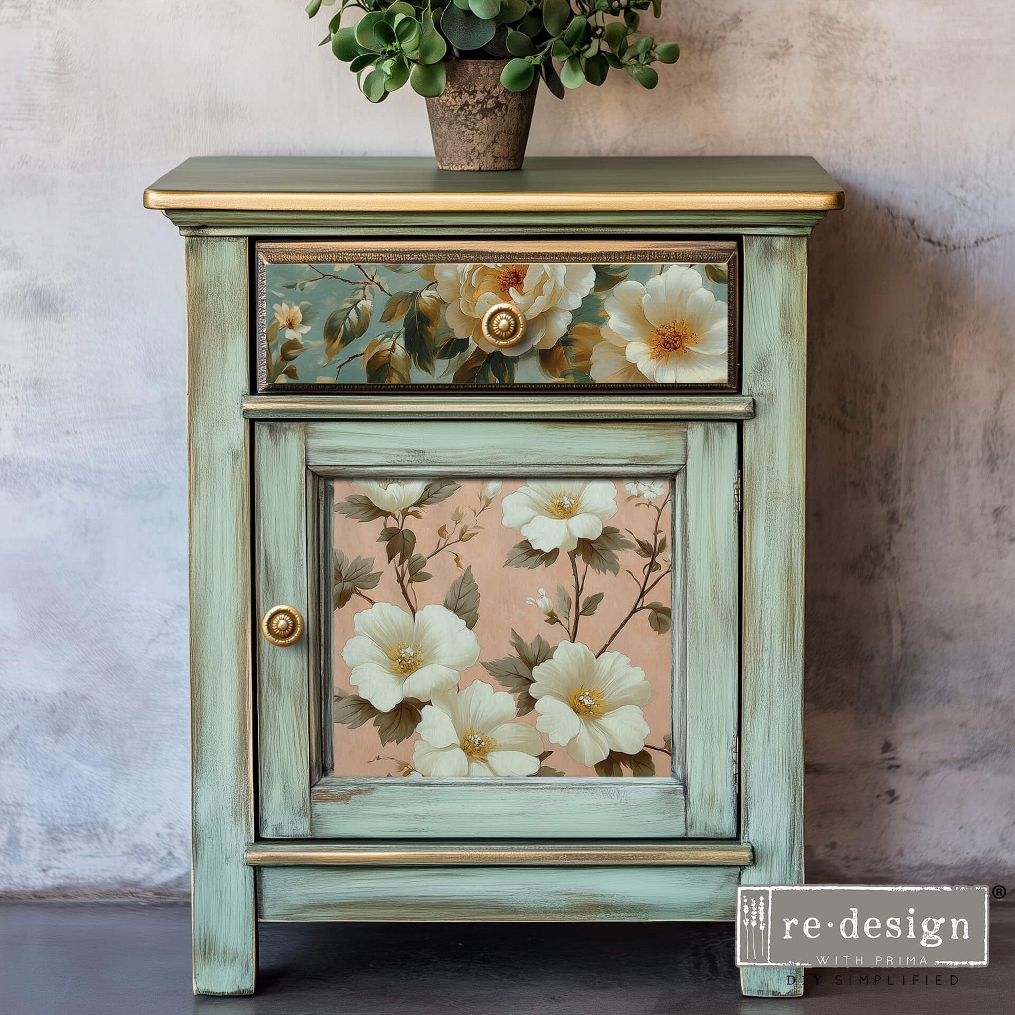 A vintage nightstand with storage  features ReDesign with Prima's Pure Petal Elegance A3 fiber paper on its drawer and door.