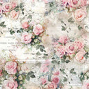 Close-up of a fiber paper design featuring blooming pink roses and greenery against vintage text.