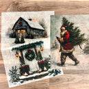 Three sheets of A3 fiber paper, each with their own design, feature a cozy barn, a vintage Santa carrying a small Christmas tree, and a beautifully decorated from porch.