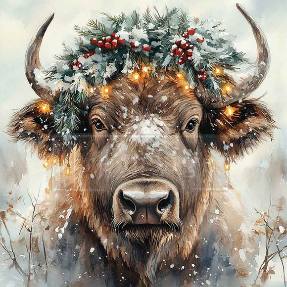 Image of a bull with a festive wreath and lights on a snowy background