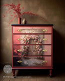 A vintage 4-drawer chest dresser is painted dark mauve pink and features ReDesign with Prima's Blush Blossom Boulevard tissue paper on the drawers.
