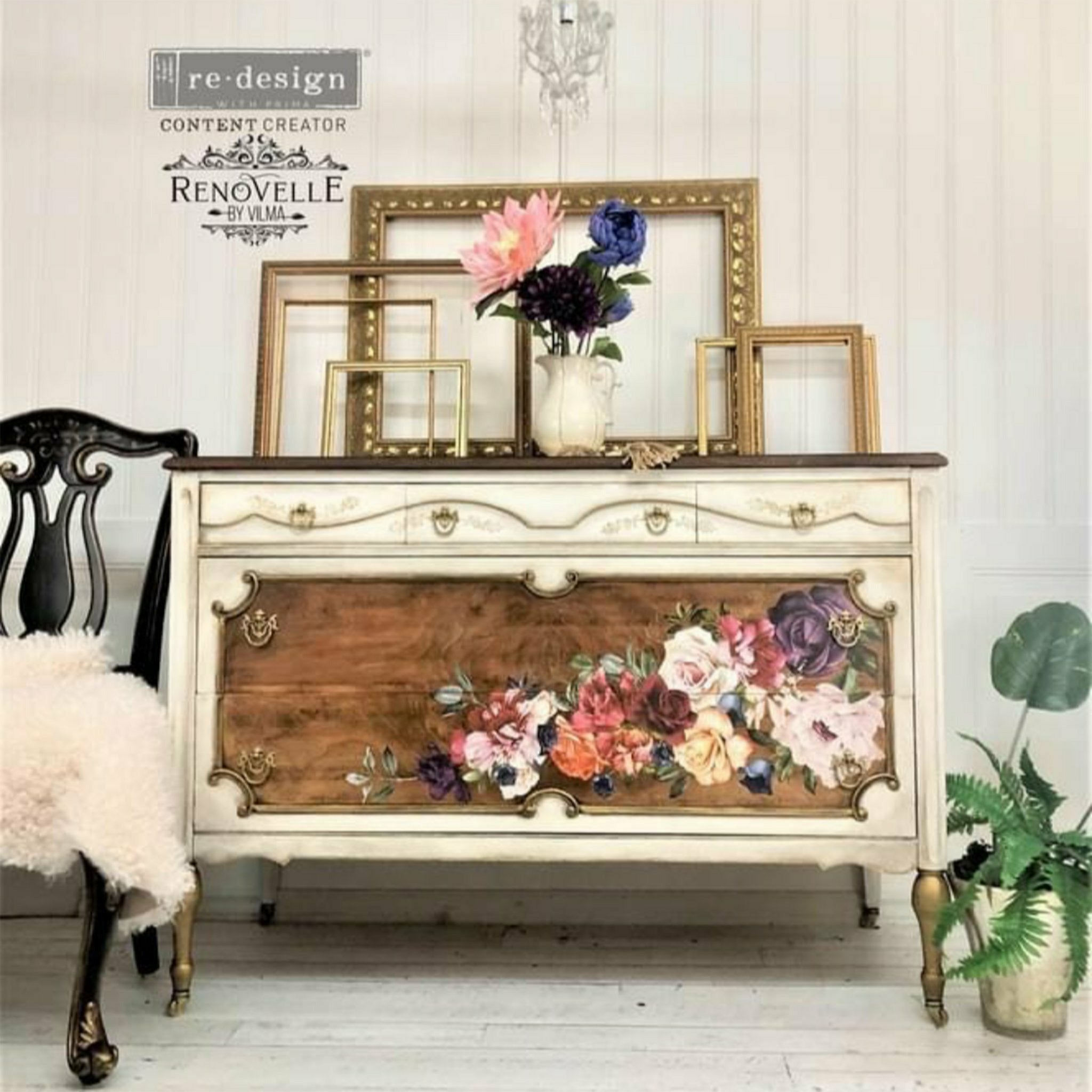 A vintage large dresser refurbished by Renovelle by Vilma is painted soft white with natural wood accents on 2 drawers and features ReDesign with Prima's Beautiful Things rub on transfer on the natural wood.