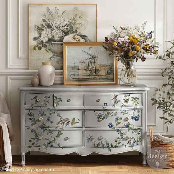 Chirping Charm furniture transfer on light gray dresser drawers with blue florals and birds for vintage decor makeover