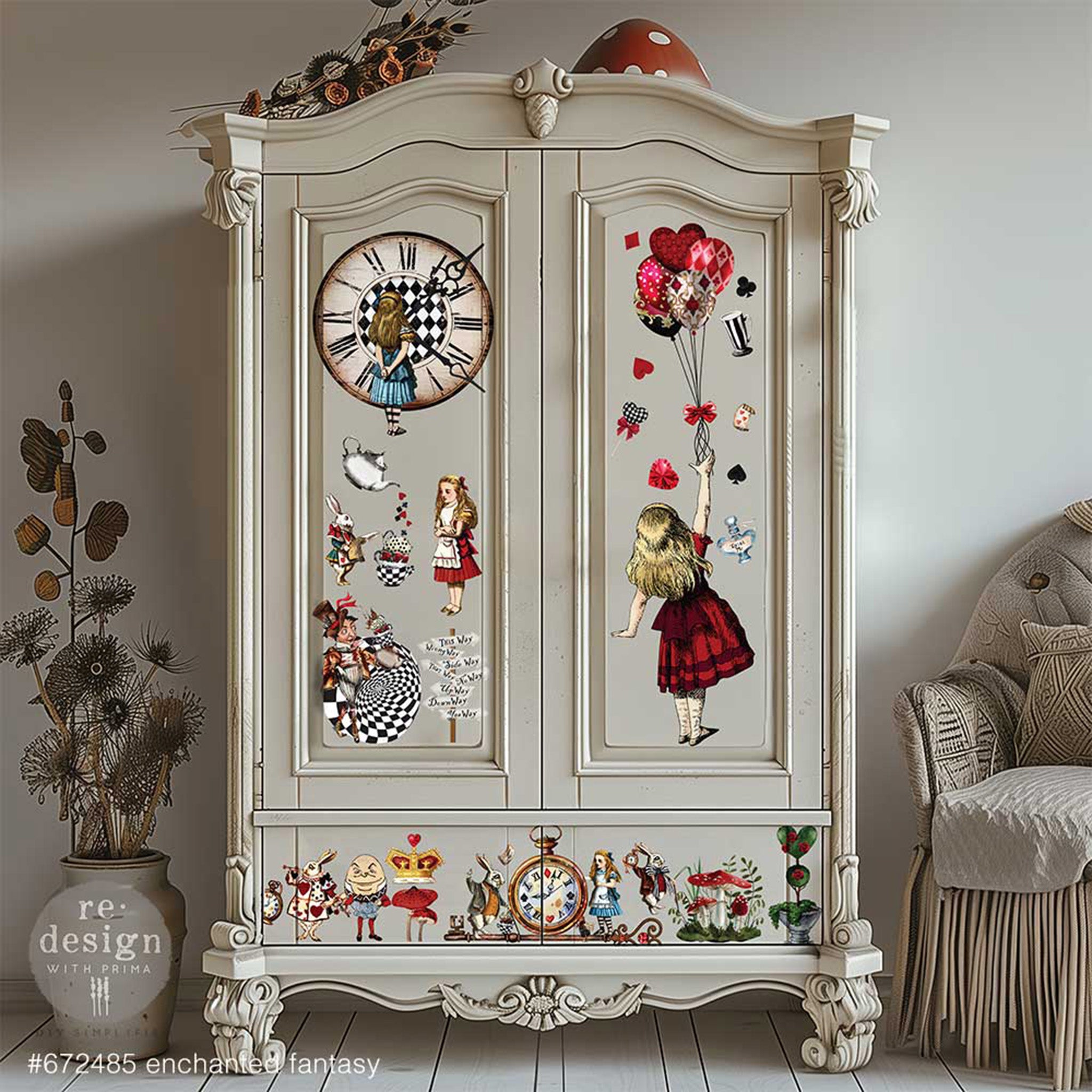 A vintage armoire is painted light beige and features ReDesign with Prima's Enchanted Fantasy transfer on the front.