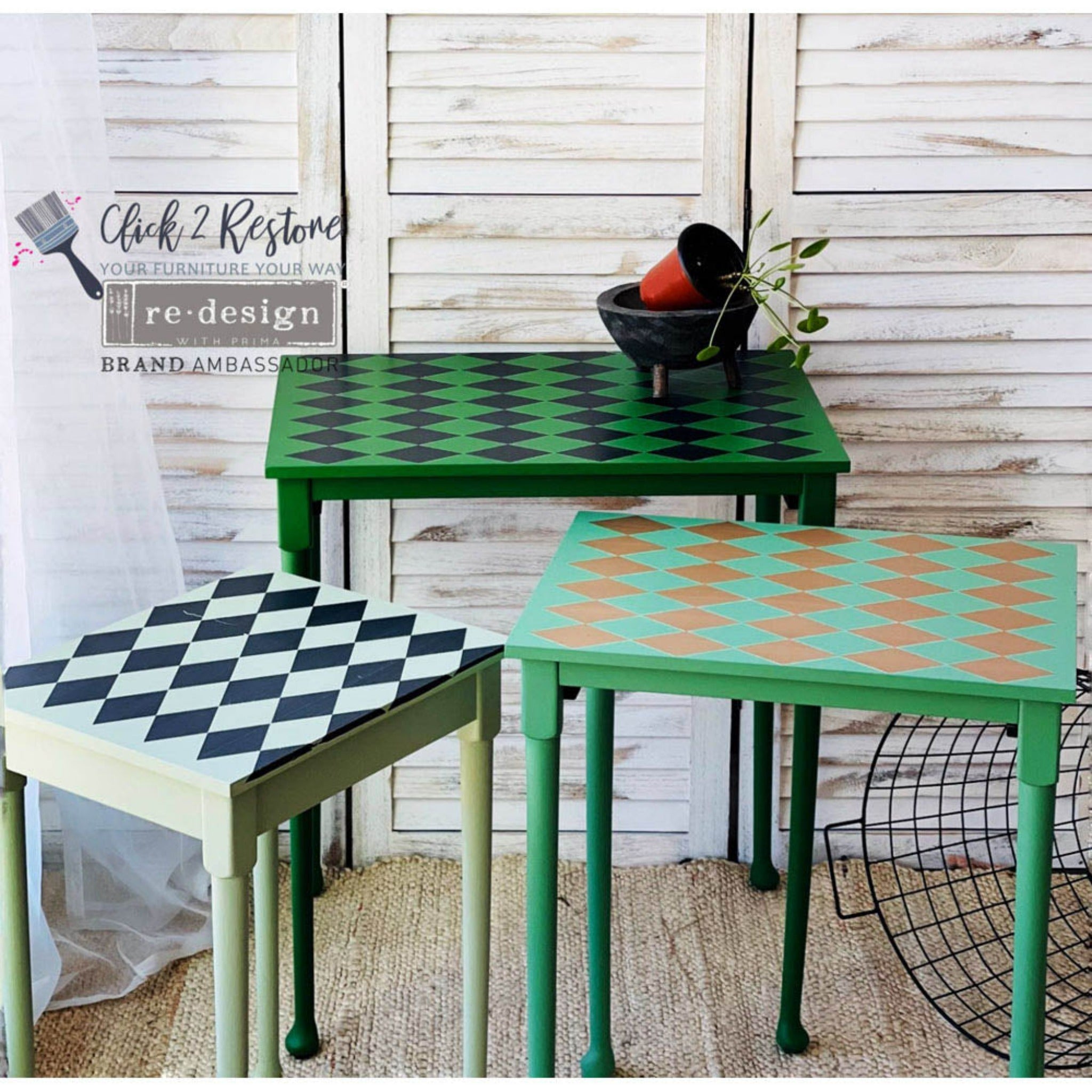 Three nesting side tables refurbished by Click 2 Restore are painted different shades of green and 2 feature the Harlequin transfer on them.
