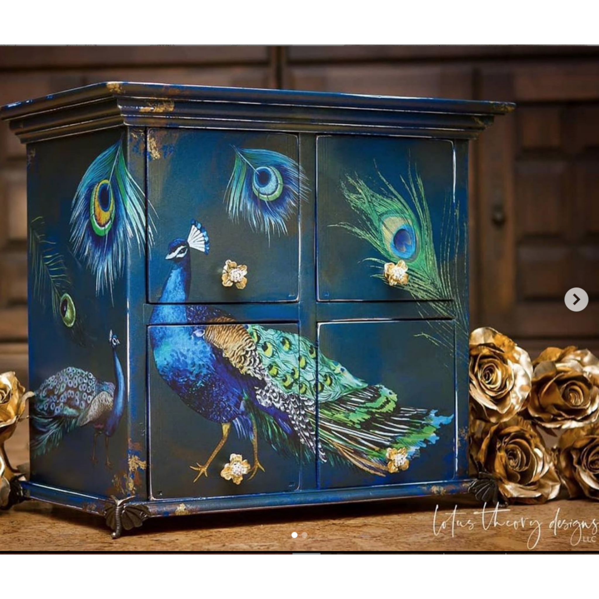 A small 4-drawer card catalog cabinet refurbished by Lotus Theory Designs is painted blue and features ReDesign with Prima's Peacock Dreams transfer on it.