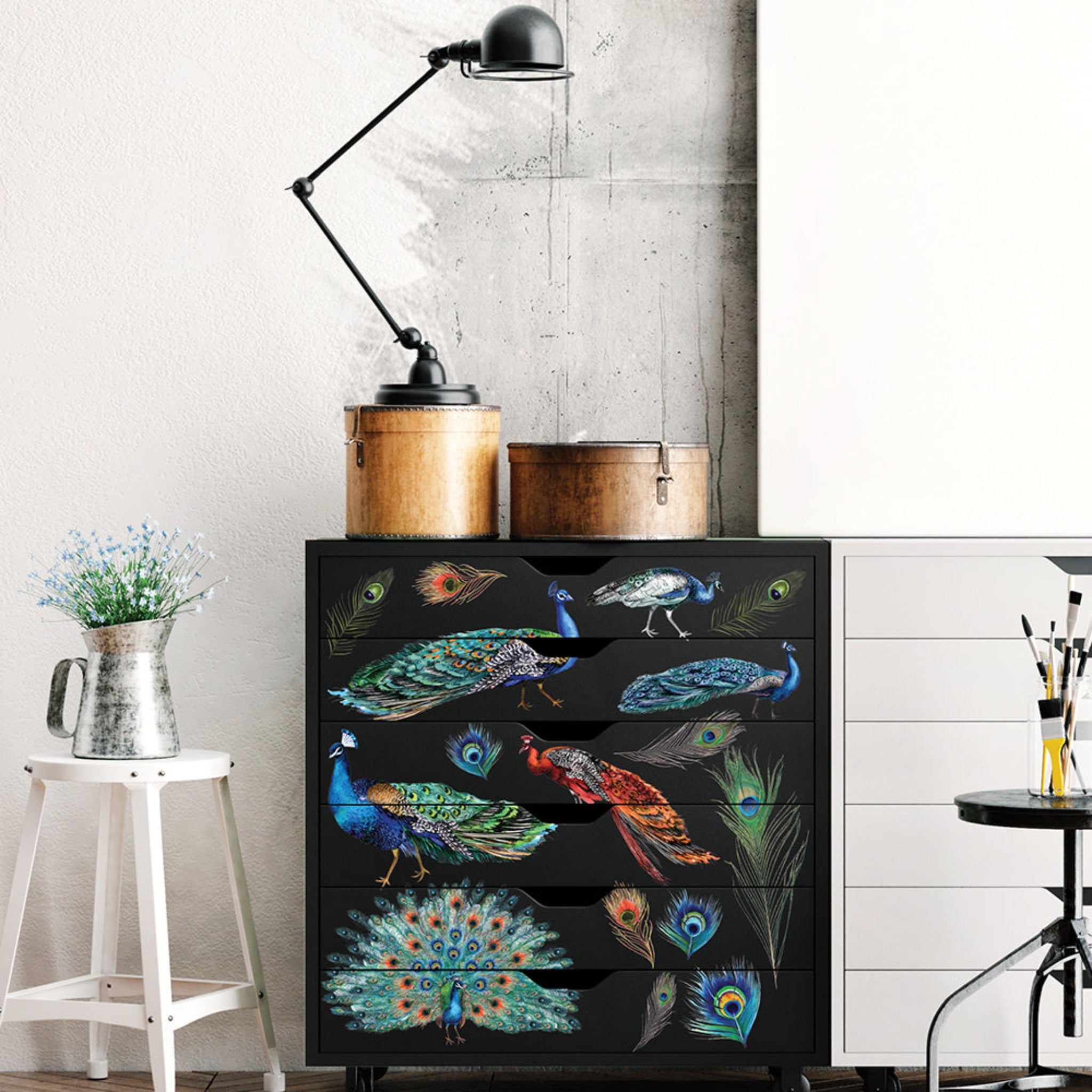 A 6-drawer craft cart or dresser is painted black and features ReDesign with Prima's Peacock Dreams transfer on  the drawers.