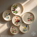 Rustic Romance water slide transfers applied to plates – ReDesign with Prima H2O floral roses wildflowers and red bird design