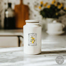 Whispers & Petals water slide transfer applied to a white jar featuring a vintage lemon label design