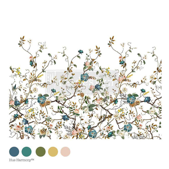 A rub-on furniture transfer featuring charming blue and cream flowers in a playful climbing vine design is against a white background. Five colors samples are under the transfer.