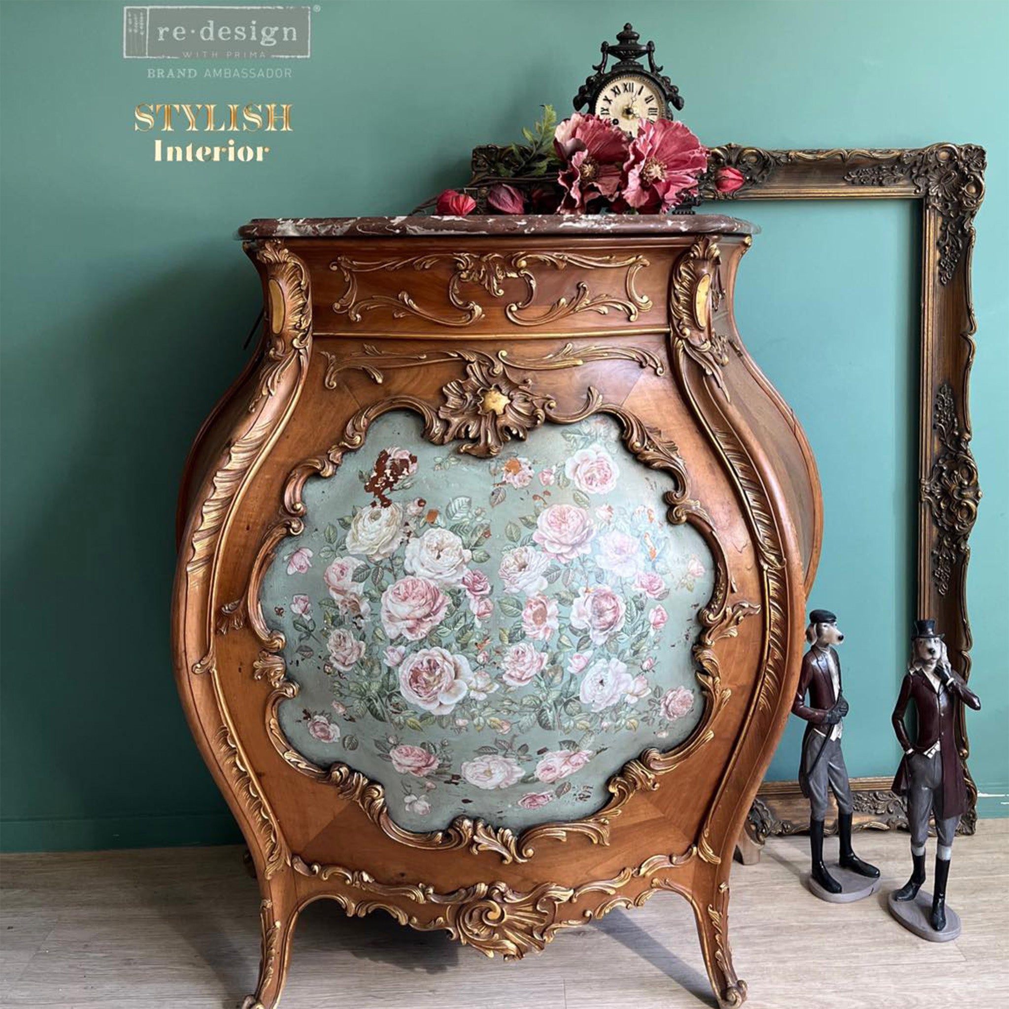 A vintage Bombay style side table refurbished by Stylish Interior has natural wood and features ReDesign with Prima's Blush Blossoms middy rub-on transfer in a door inlay over light teal paint.