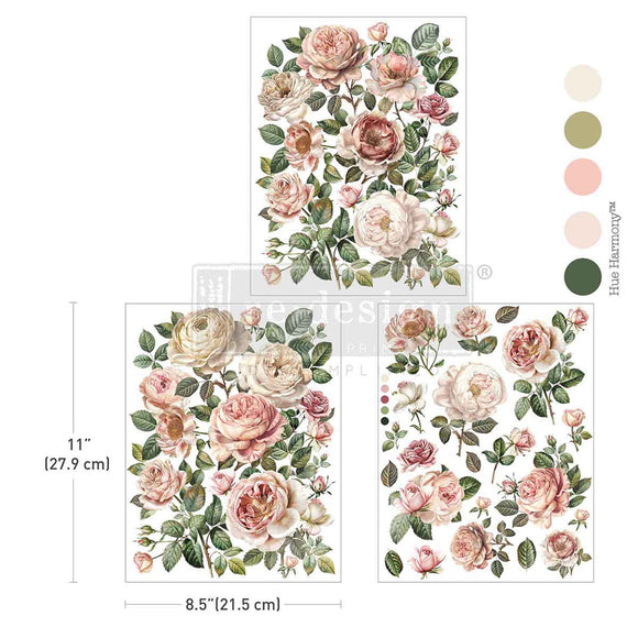 Three sheets of ReDesign with Prima's Blush Blossoms small rub-on transfers are against a white background with 5 matching color samples. Measurements for 1 sheet reads 11" (27.9 cm) y 8.5" (21.5 cm)