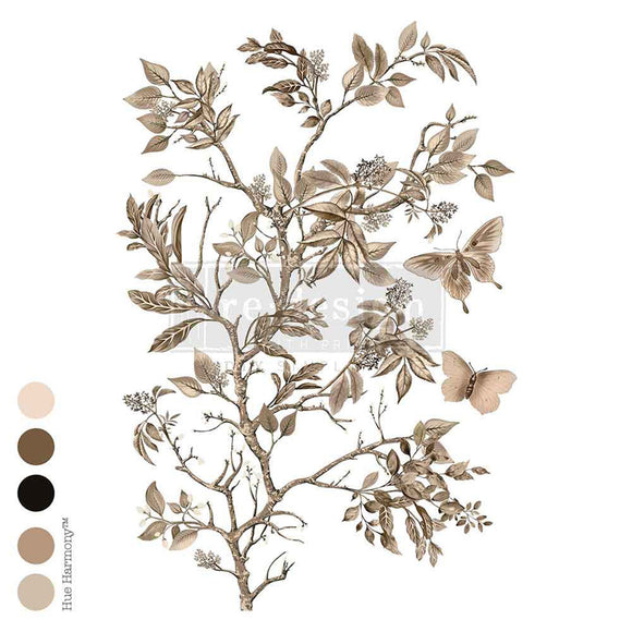 A rub-on transfer featuring delicate tan flowering branches surrounded by fluttering butterflies is against a white background. Five color samples are on the bottom left of the photo.
