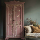 A vintage armoire is painted blush pink and features ReDesign with Prima's Branch Harmony rub-on furniture transfer on its doors.