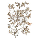 A rub-on transfer featuring delicate tan flowering branches surrounded by fluttering butterflies is against a white background.