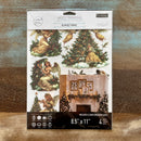 A package of ReDesign with Prima's Heavenly Wings middy rub-on transfers is against a wood background.