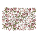 Rub-on transfer featuring delicate pink and mauve roses on lush green stems is against a white background.
