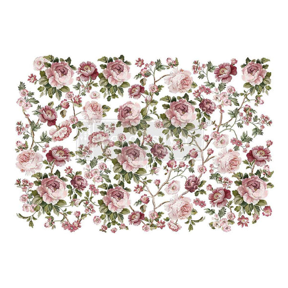 Rub-on transfer featuring delicate pink and mauve roses on lush green stems is against a white background.