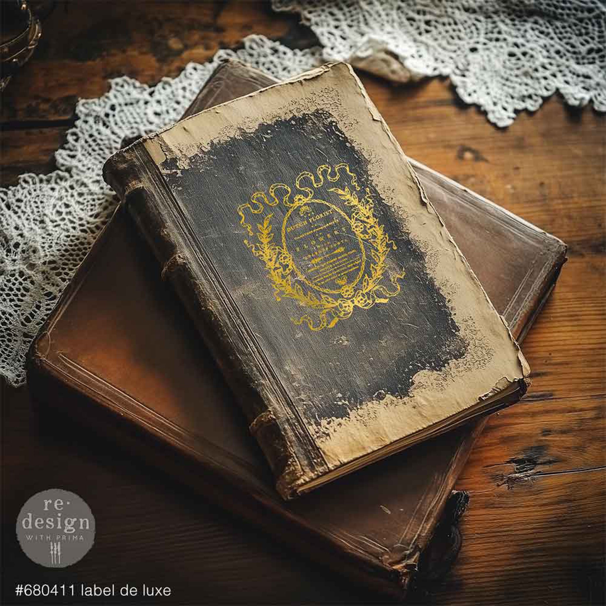 Vintage book with decorative cover on a wooden surface