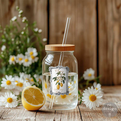 Glass jar with lemon botanical label applied using Fleur de Frame Luxe Transfer by ReDesign with Prima