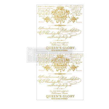 Two sheets of tissue paper featuring gold French script and crests are against a white background.