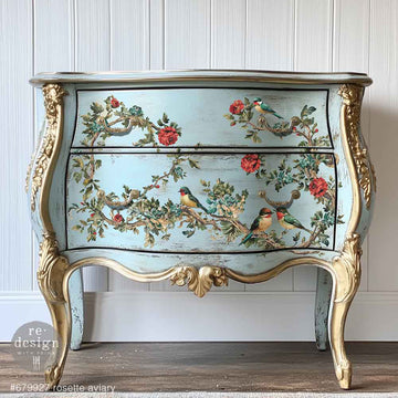 Rosette Aviary transfer on blue curved-front dresser with gold trim, vintage floral bird furniture makeover