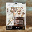 A package of ReDesign with Prima's Rosette Royale middy rub-on transfers is against a wood background.