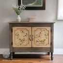 A small buffet cabinet features ReDesign with Prima's Belle Epoque Blooms small rub-on transfers on its 2 doors.