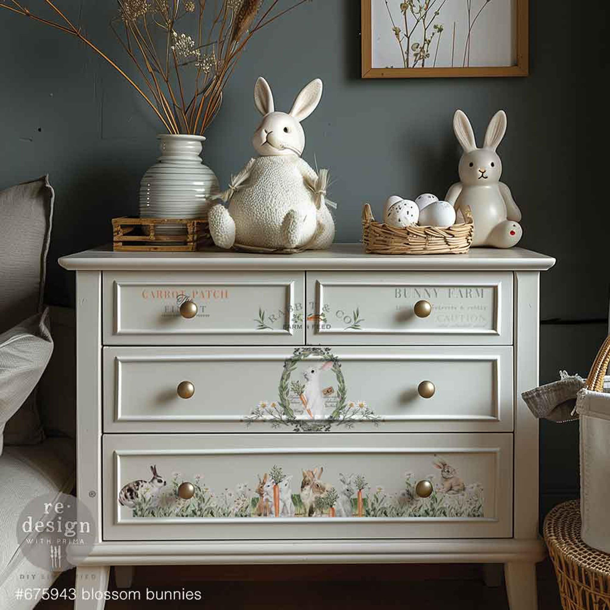 A white 4-drawer dresser features ReDesign with Prima's Blossom Bunnies small rub-on transfers on the front.