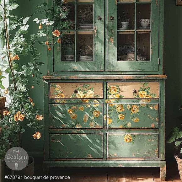A country style hutch is painted green and features ReDesign with Prima's Bouquet de Provence middy rub-on transfers on its 6 lower drawers.