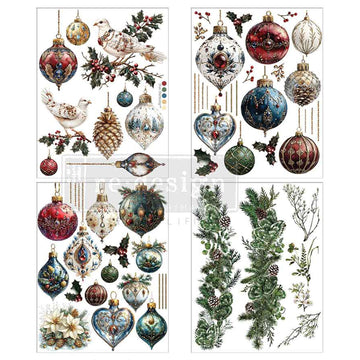 Four sheets of small rub-on transfers, each with their own design, feature glass Christmas ornaments adorned with lush greenery and peaceful doves and are against a white background.