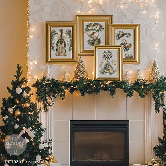Four gold frames above a fireplace decorated with Christmas decorations feature ReDesign with Prima's Heavenly Wings middy rub-on transfers.