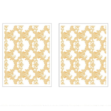 Two sheets of small rub-on transfers featuring a gold foil intricate lace pattern are against a white background.