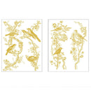 Two sheets of gold foil small rub-on transfers featuring birds on flowering tree branches are against a white background.