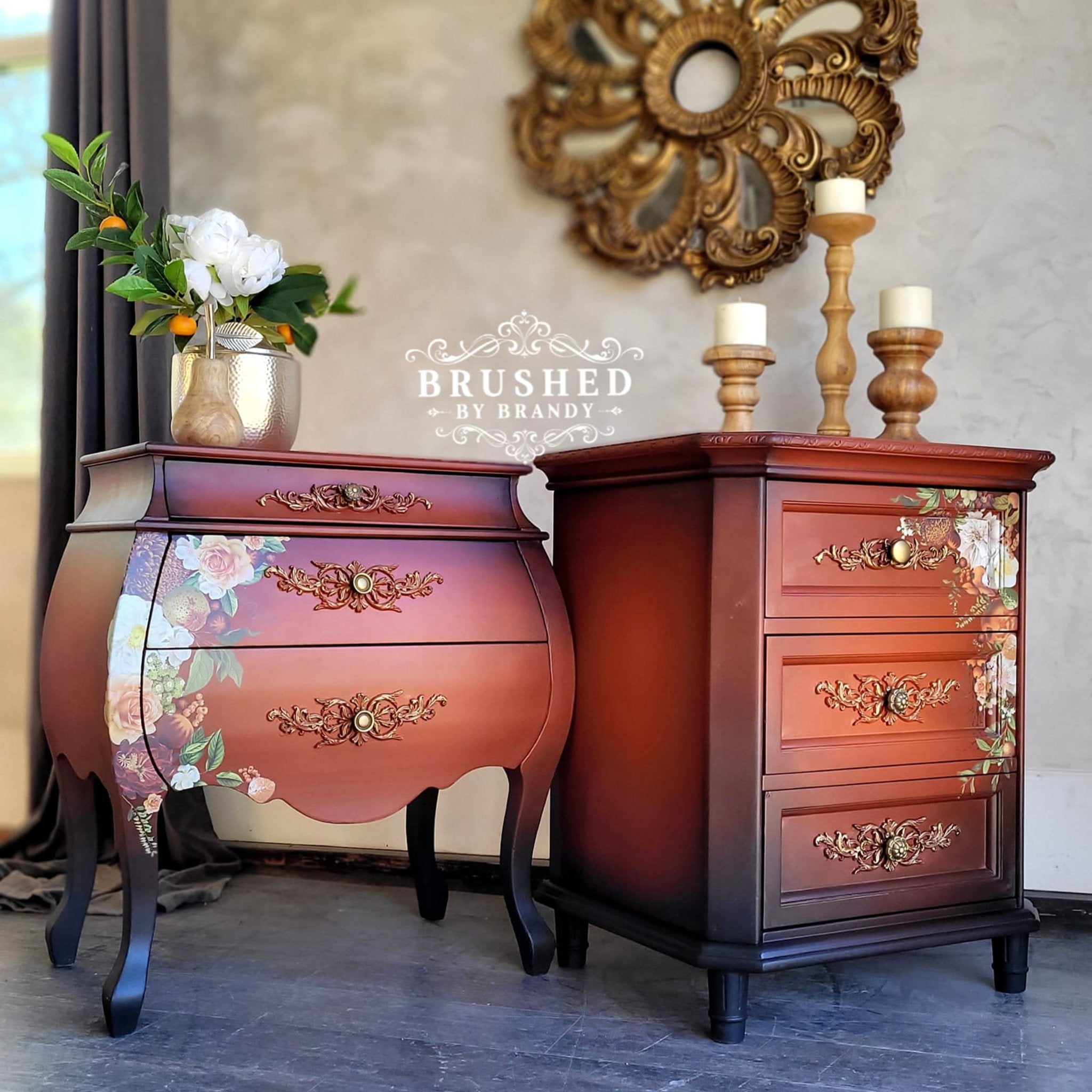 Two vintage 3-drawer nightstands, 1 is a Bombay style, refurbished by Brushed by Brandy are painted an ombre blend of burnt orange down to black and features ReDesign with Prima's Seasonal Splendor middy transfer on them.