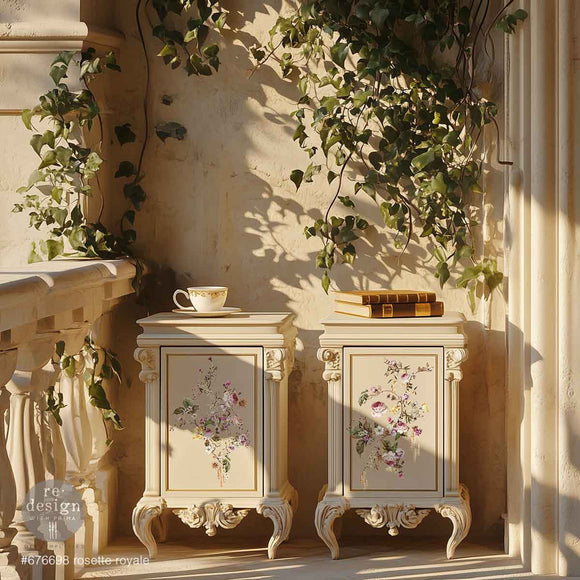 Two vintage nightstands with storage are painted beige and feature ReDesign with Prima's Rosette Royale middy rub-on transfers on their doors.