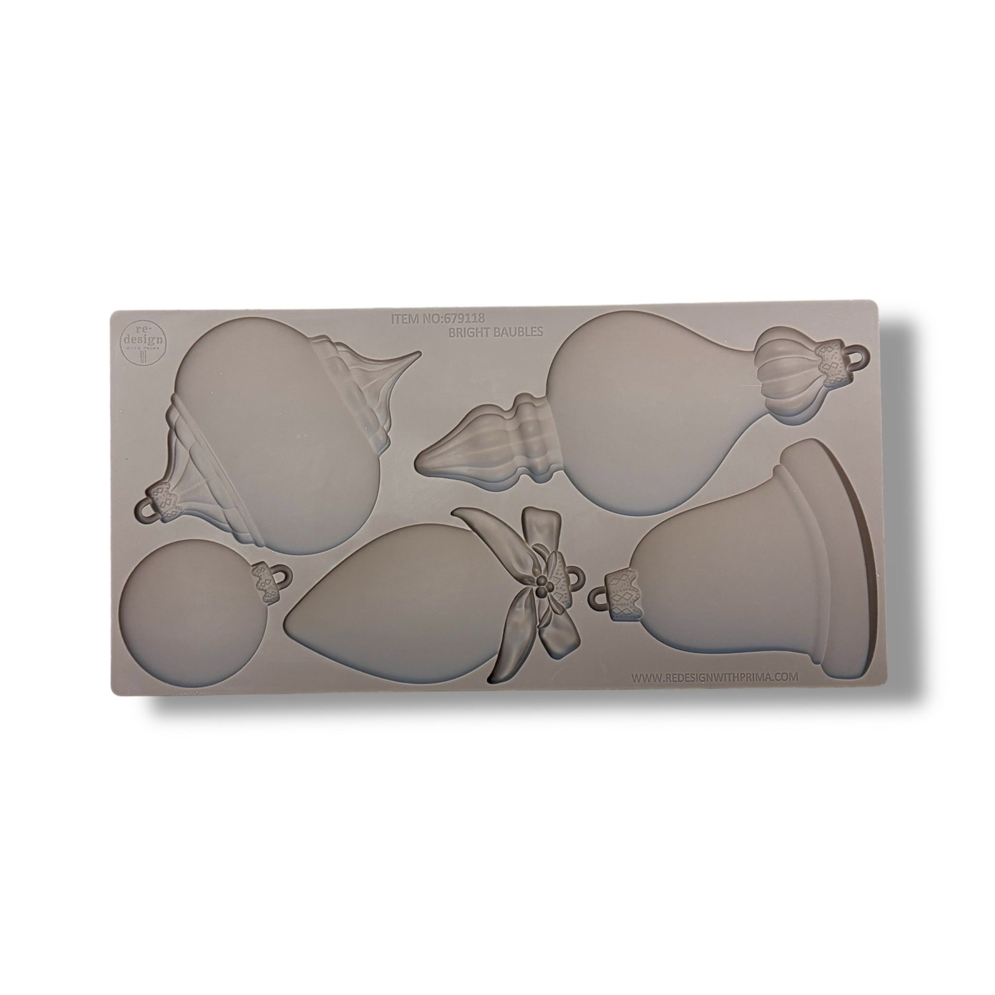 Silicone mold with Christmas ornament shapes on a white background