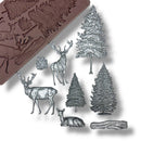 Silicone mold with forest-themed designs including deer and trees on a white background.