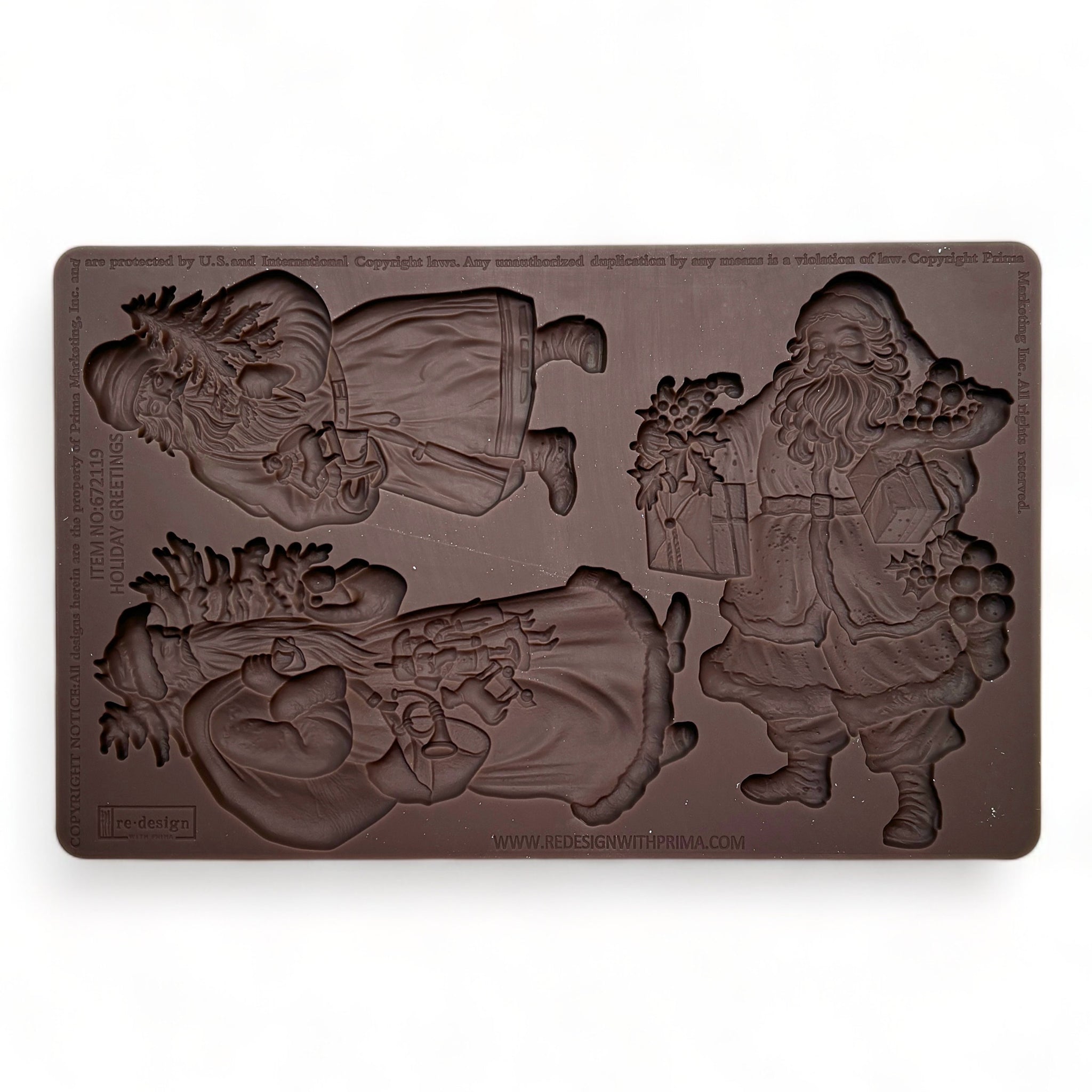 A brown silicone mold featuring 3 festive designs of Santa Claus with Christmas gifts and greenery is against a white background.