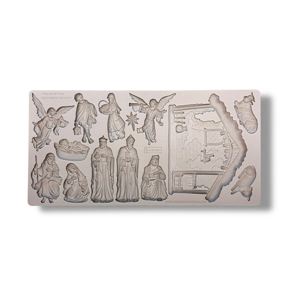 Mold with nativity scene figures on a white background