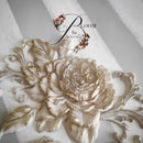 Dimensional rose applique made with ReDesign with Prima Rosewood Romance silicone mold on a painted furniture surface