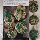Decorative green and gold ornaments with packaging labeled 'Decor Moulds'.