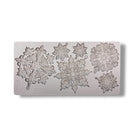 Decorative snowflake mold on a white background