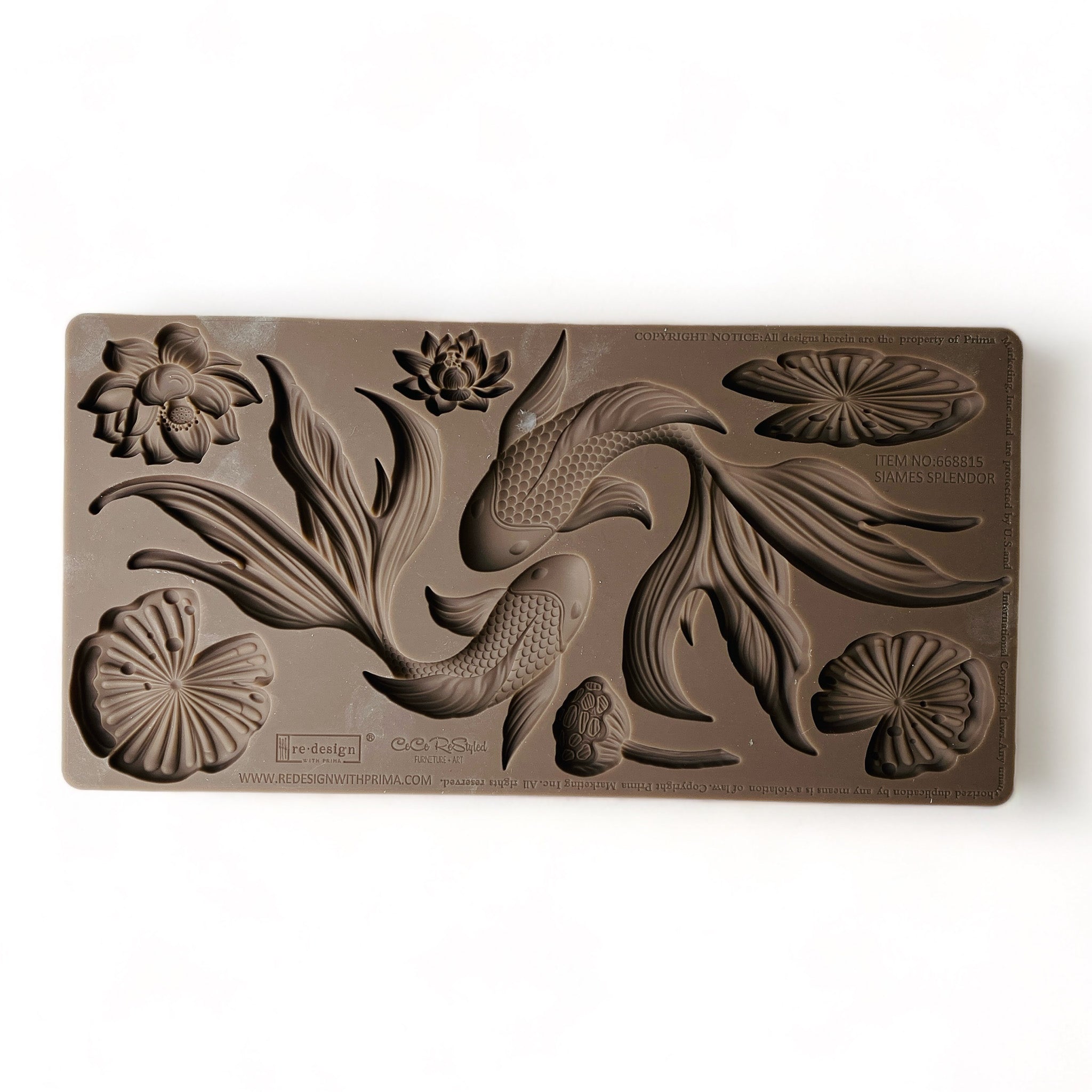 A brown silicone mold featuring 2 intricately-detailed koi fish, surrounded by water lilies and lily pads is against a white background.