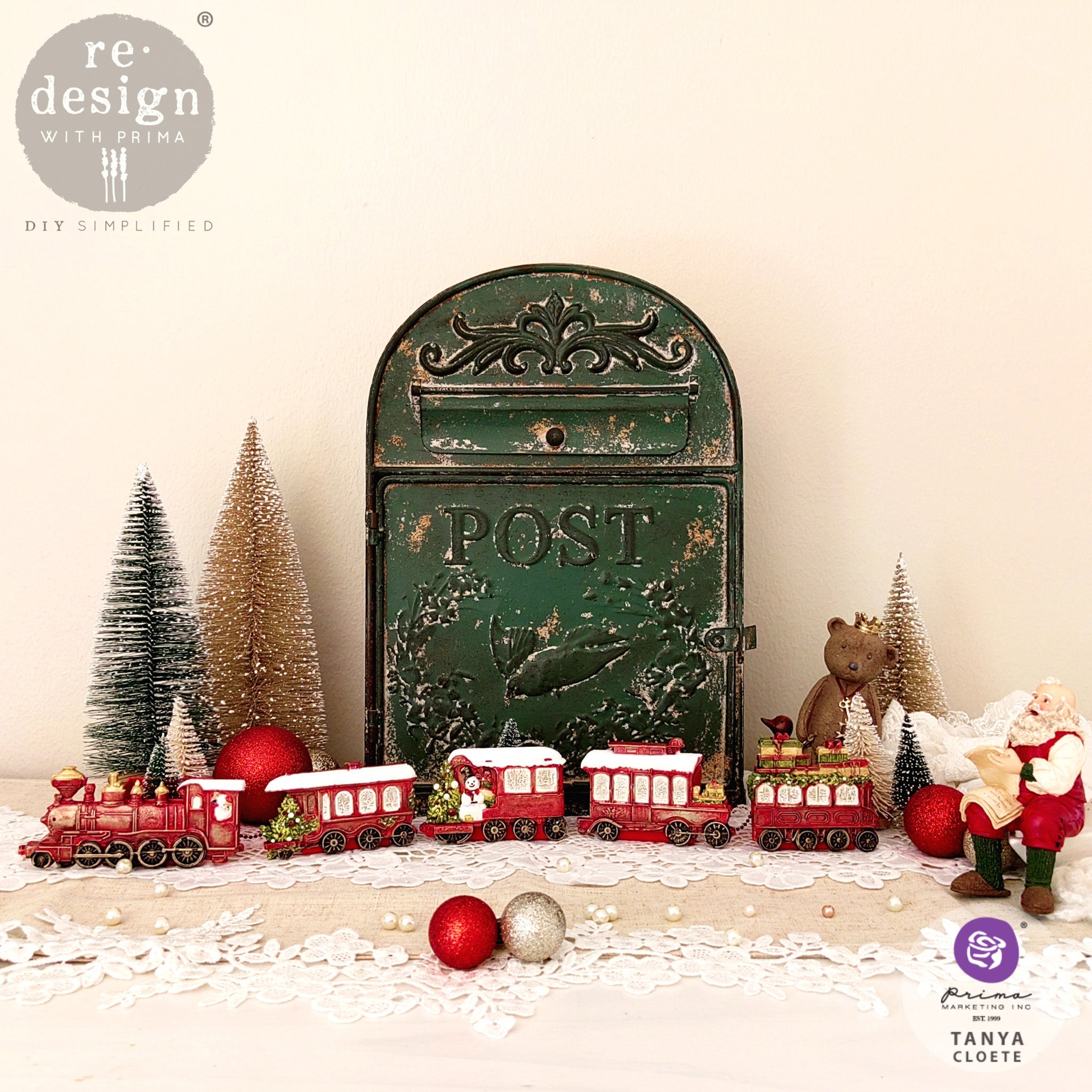 Colorful castings created by Tanya Coete made from ReDesign with Prima's Jolly Express silicone mold are set up on display with other Christmas items.