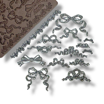 Silver bow-shaped decorations with a mold on a white background